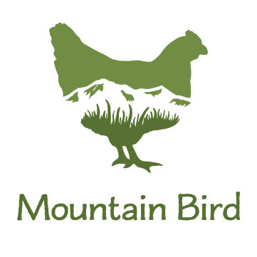 Mountain Bird — a hen silhouette filled with mountains and grass